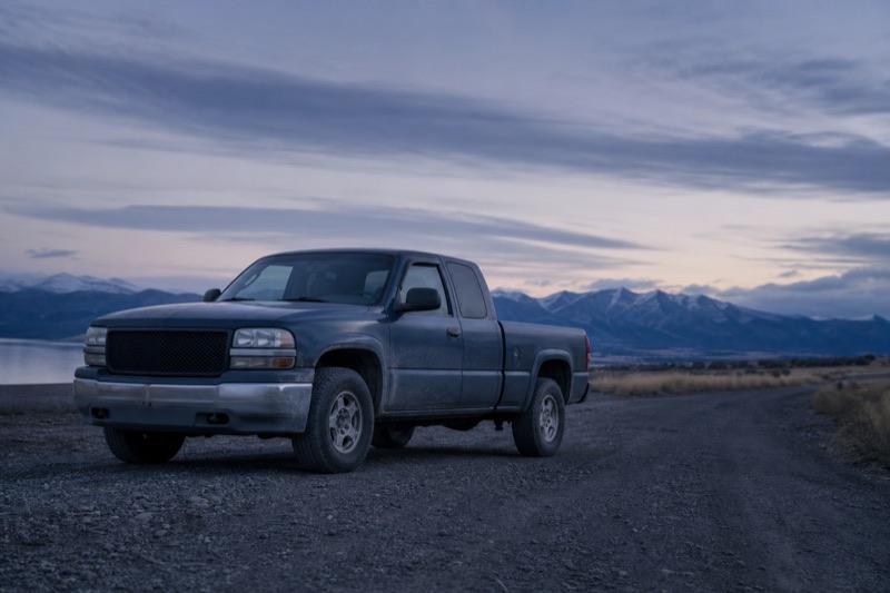 A used pickup truck on a rural road